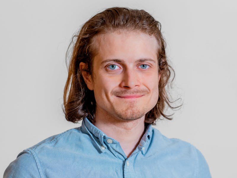 Portrait of Jan Winther, a ServiceNow professional, wearing a light blue button-down shirt.