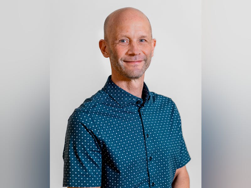 Portrait of Martin Green, a ServiceNow professional, wearing a blue patterned shirt.