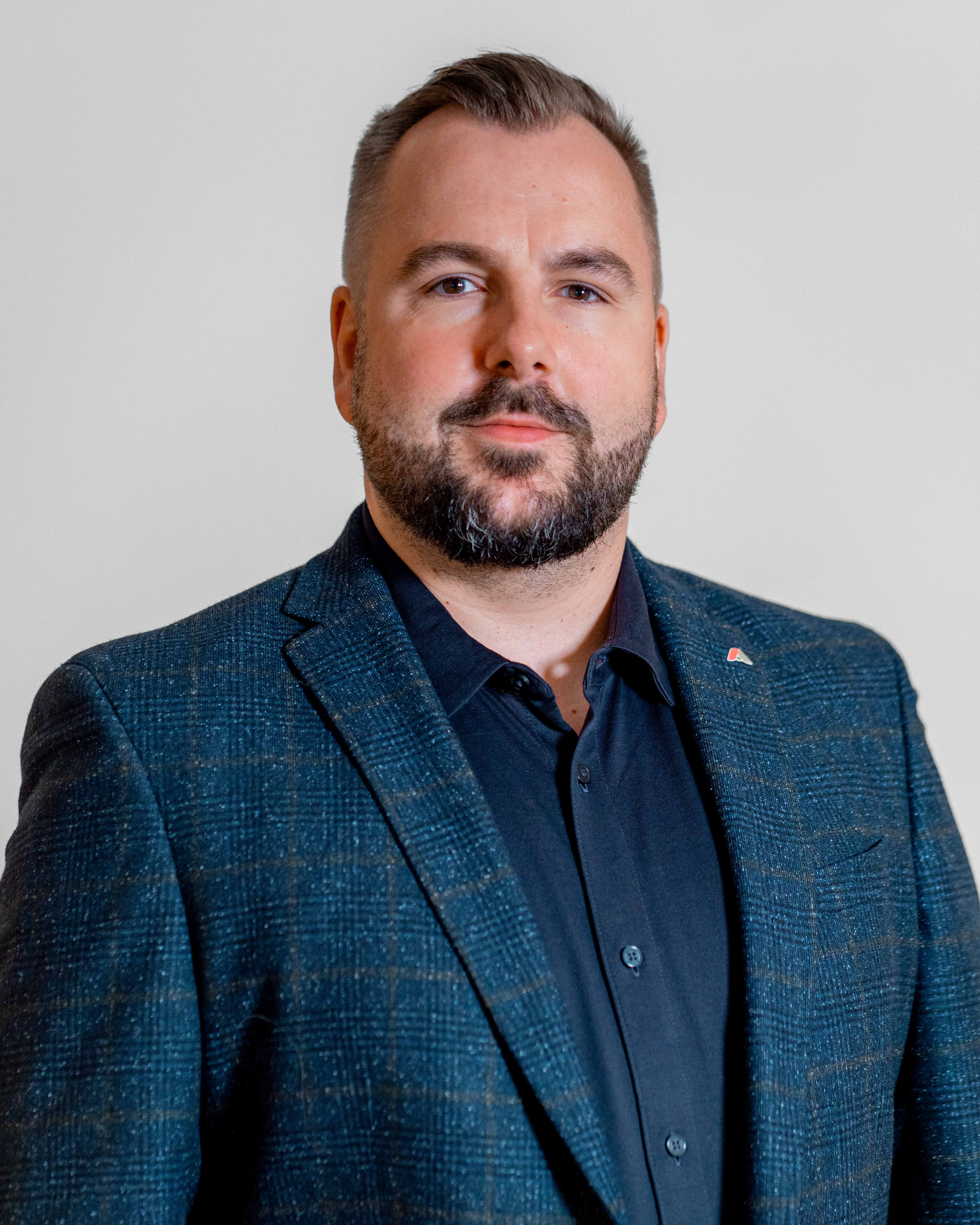 Professional portrait of Morten Christiansen, a team member at ServiceNow partner Adeno.