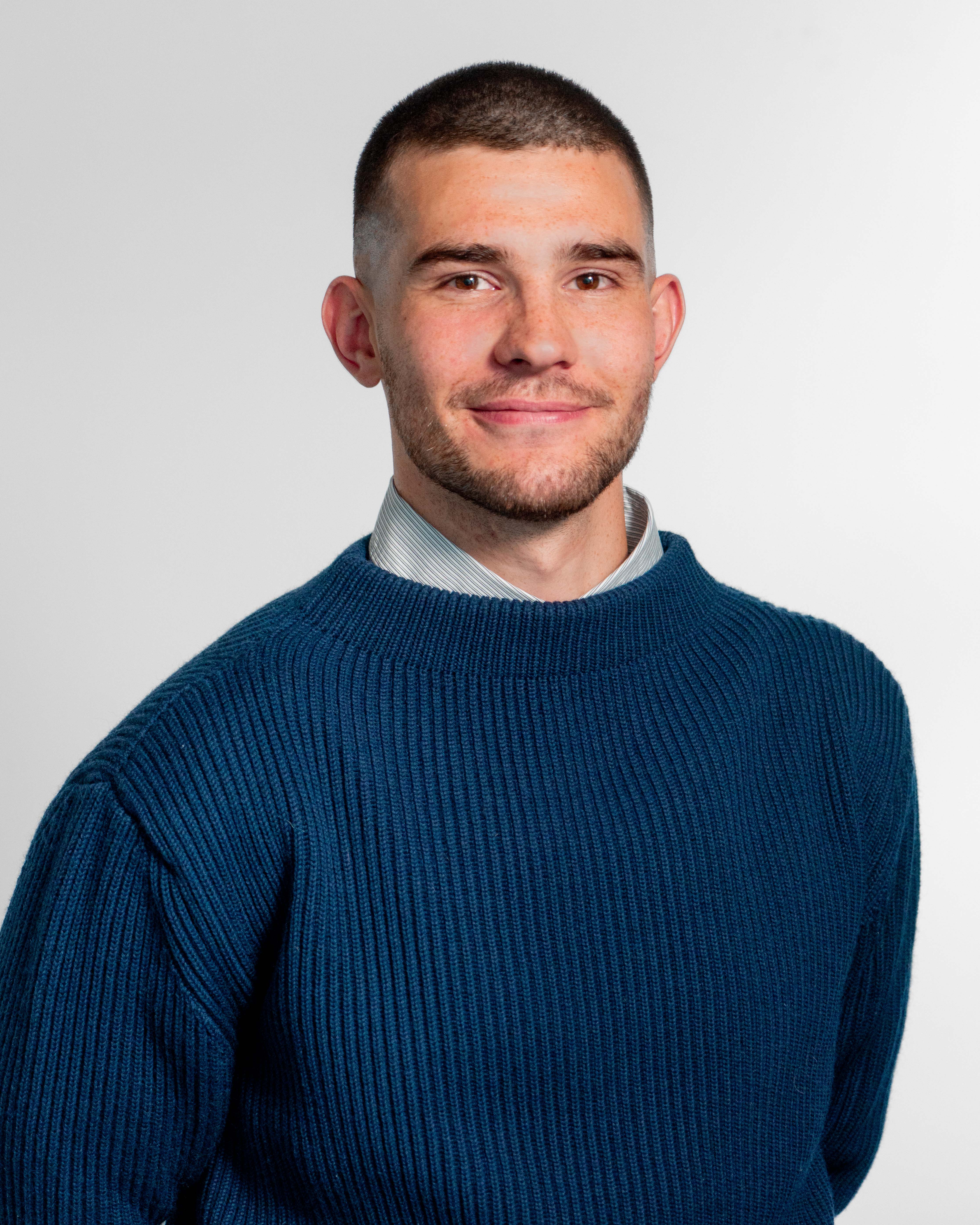 Professional portrait of Oskar Jensen, a team member at ServiceNow partner Adeno.