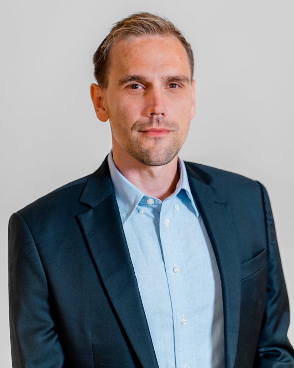 Professional portrait of Sebastian Flytklint Laursen from ServiceNow partner Adeno.