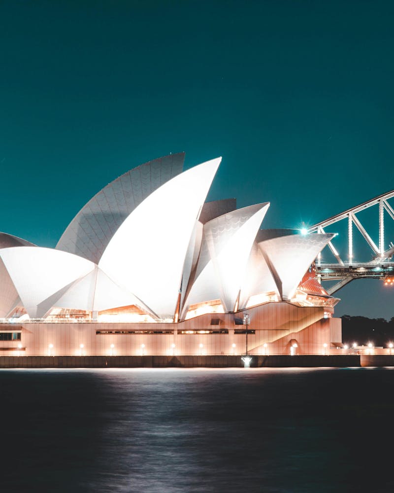 Night view of the Sydney Opera House and Sydney Harbour Bridge for the ServiceNow Australia Release.