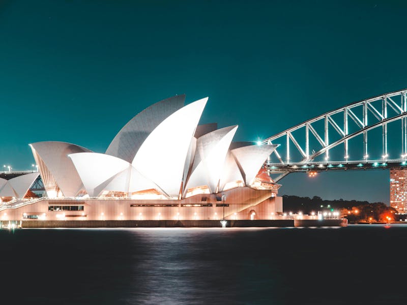 Night view of the Sydney Opera House and Sydney Harbour Bridge for the ServiceNow Australia Release.
