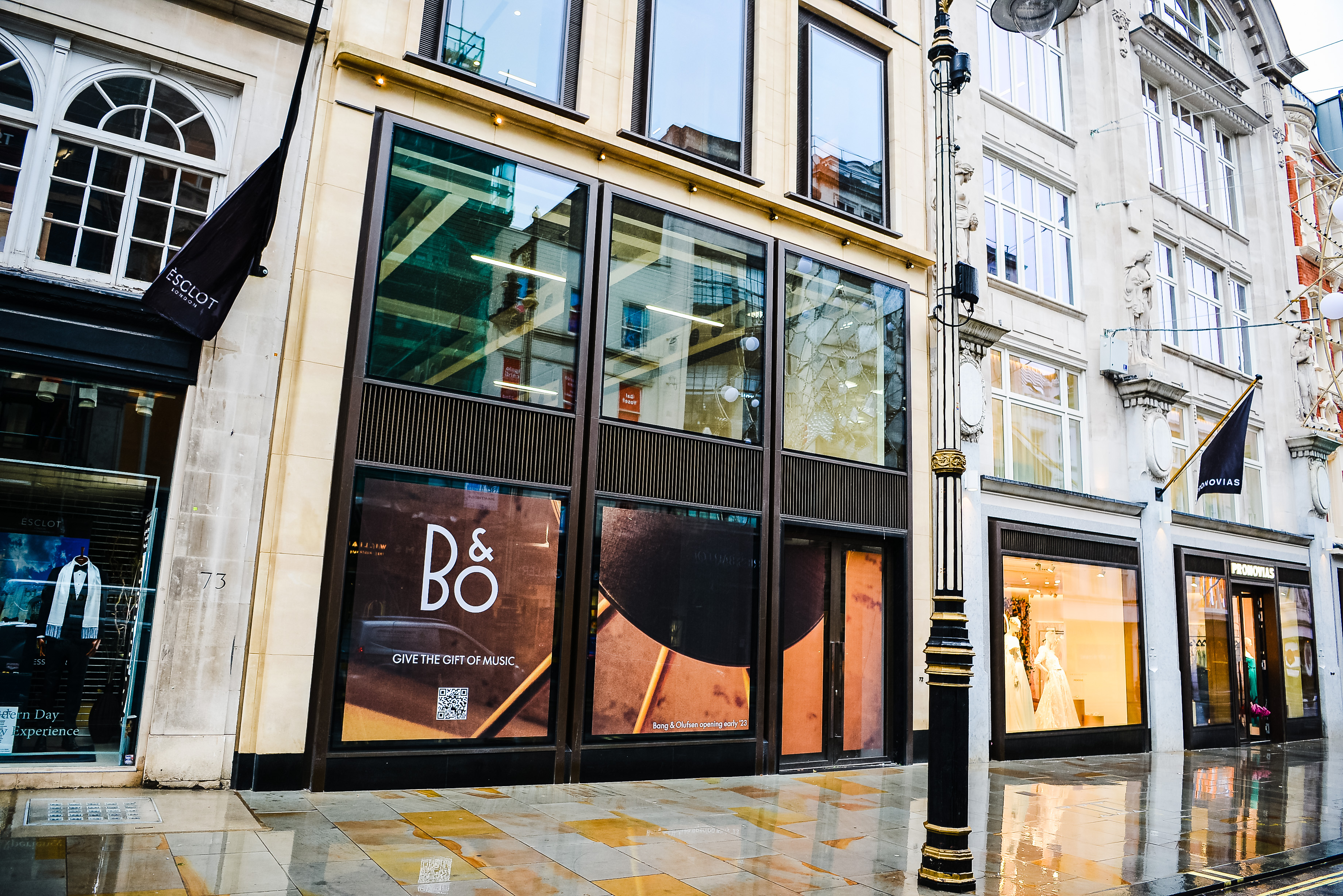Street-level view of a Bang & Olufsen storefront with window displays and the B&O logo, relevant to ServiceNow.