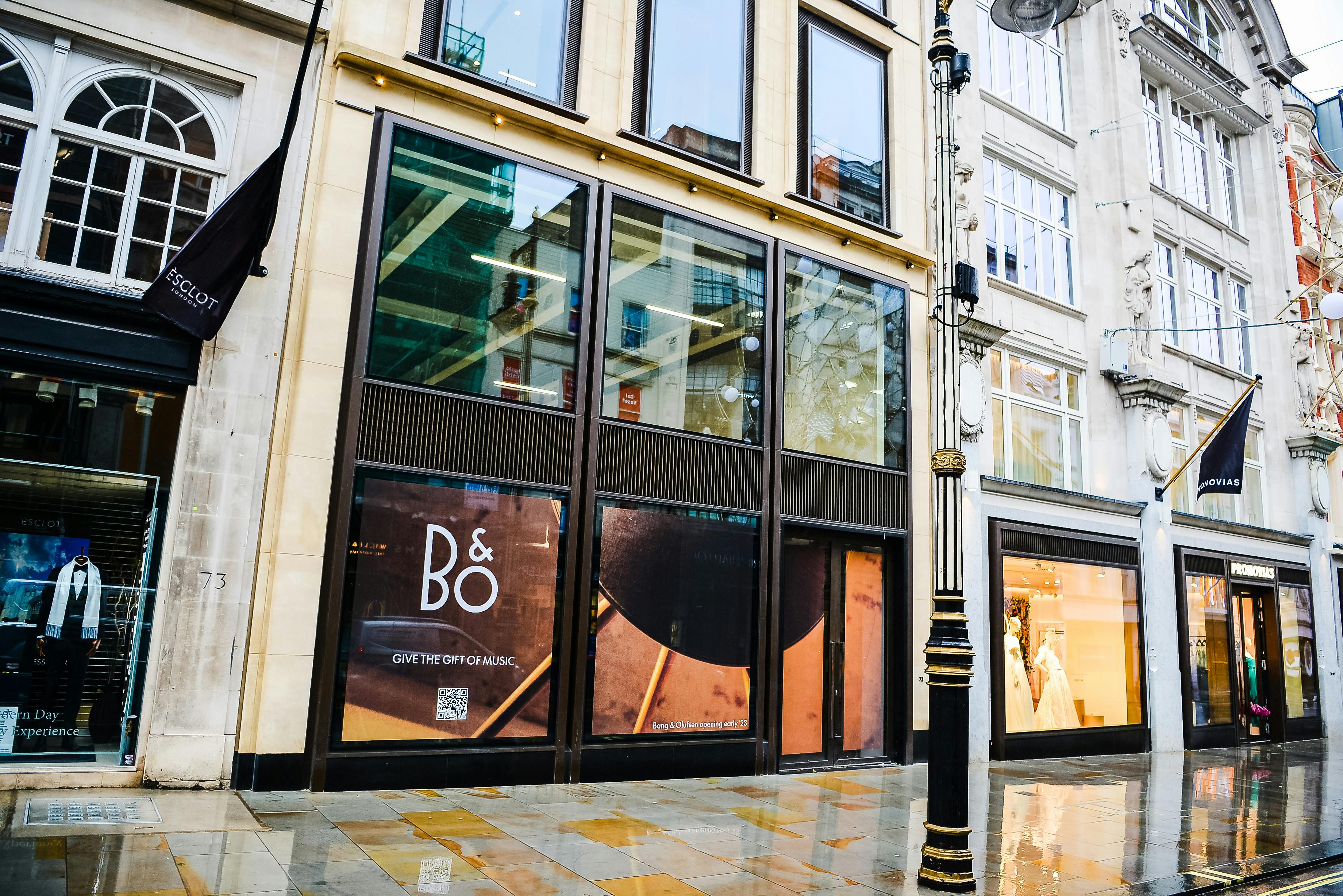 Street-level view of a Bang & Olufsen storefront with window displays and the B&O logo, relevant to ServiceNow.