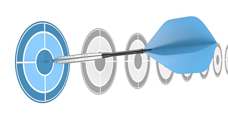 A blue dart hitting the bullseye of a blue target, illustrating ServiceNow adoption blueprints.