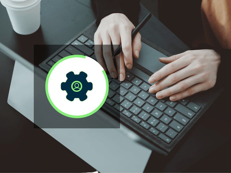 Hands typing on a laptop keyboard with a ServiceNow SN Utils icon overlay.