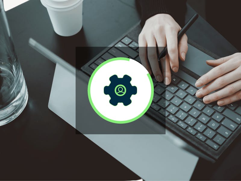 Hands typing on a laptop keyboard with a ServiceNow SN Utils icon overlay.