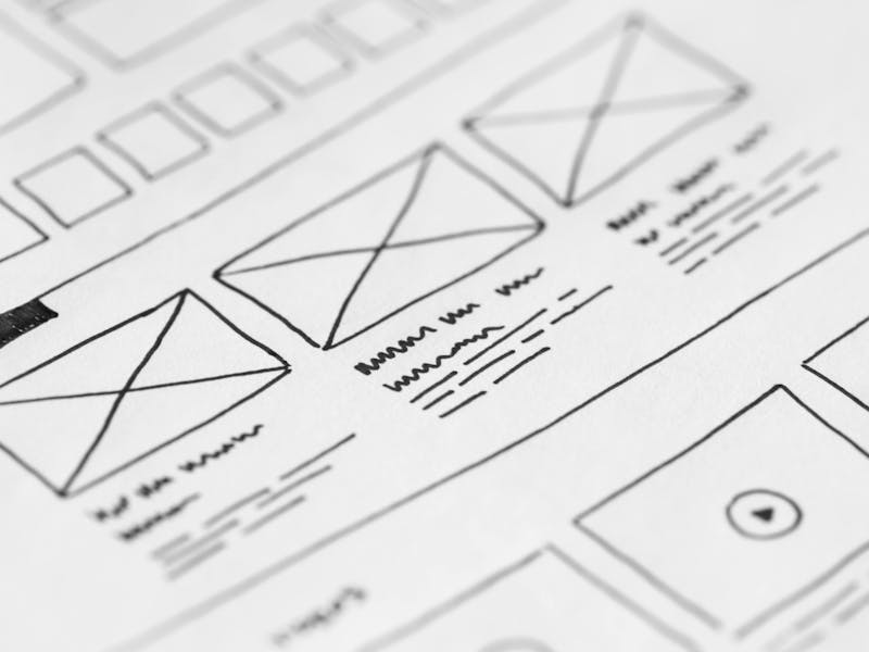 Hand-drawn wireframe of a ServiceNow UI Builder layout on paper.
