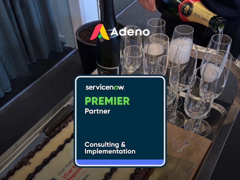 Champagne being poured into glasses next to a cake with text announcing Adeno as a ServiceNow Premier Partner.
