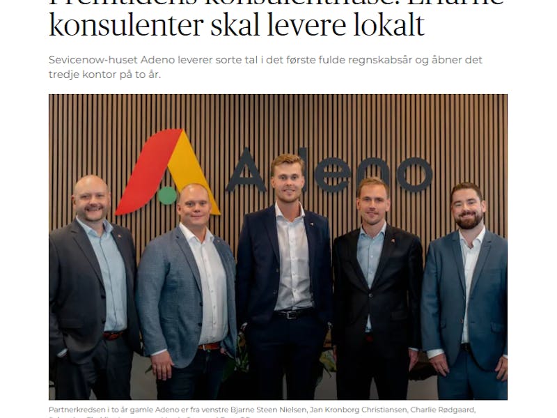 Five men standing in front of the Adeno logo, a ServiceNow partner.