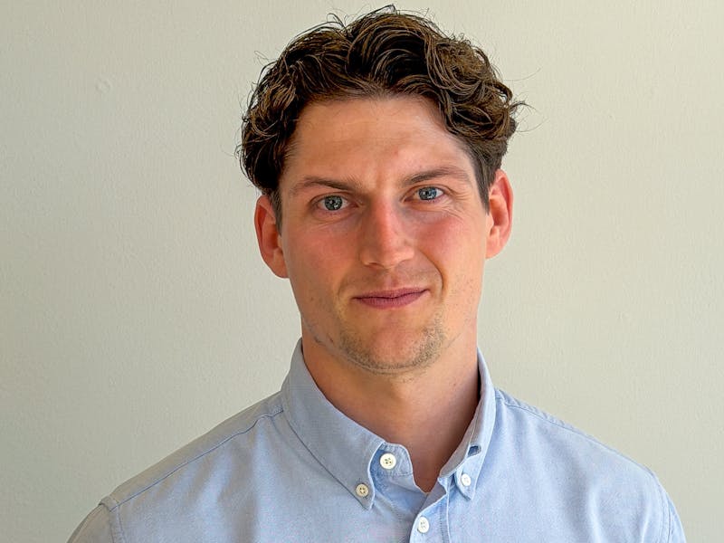 Portrait of Martin Krabbe Nielsen, a ServiceNow professional, wearing a light blue button-down shirt.