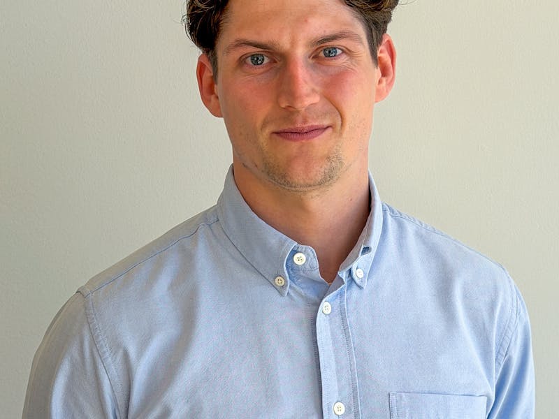 Portrait of Martin Krabbe Nielsen, a ServiceNow professional, wearing a light blue button-down shirt.