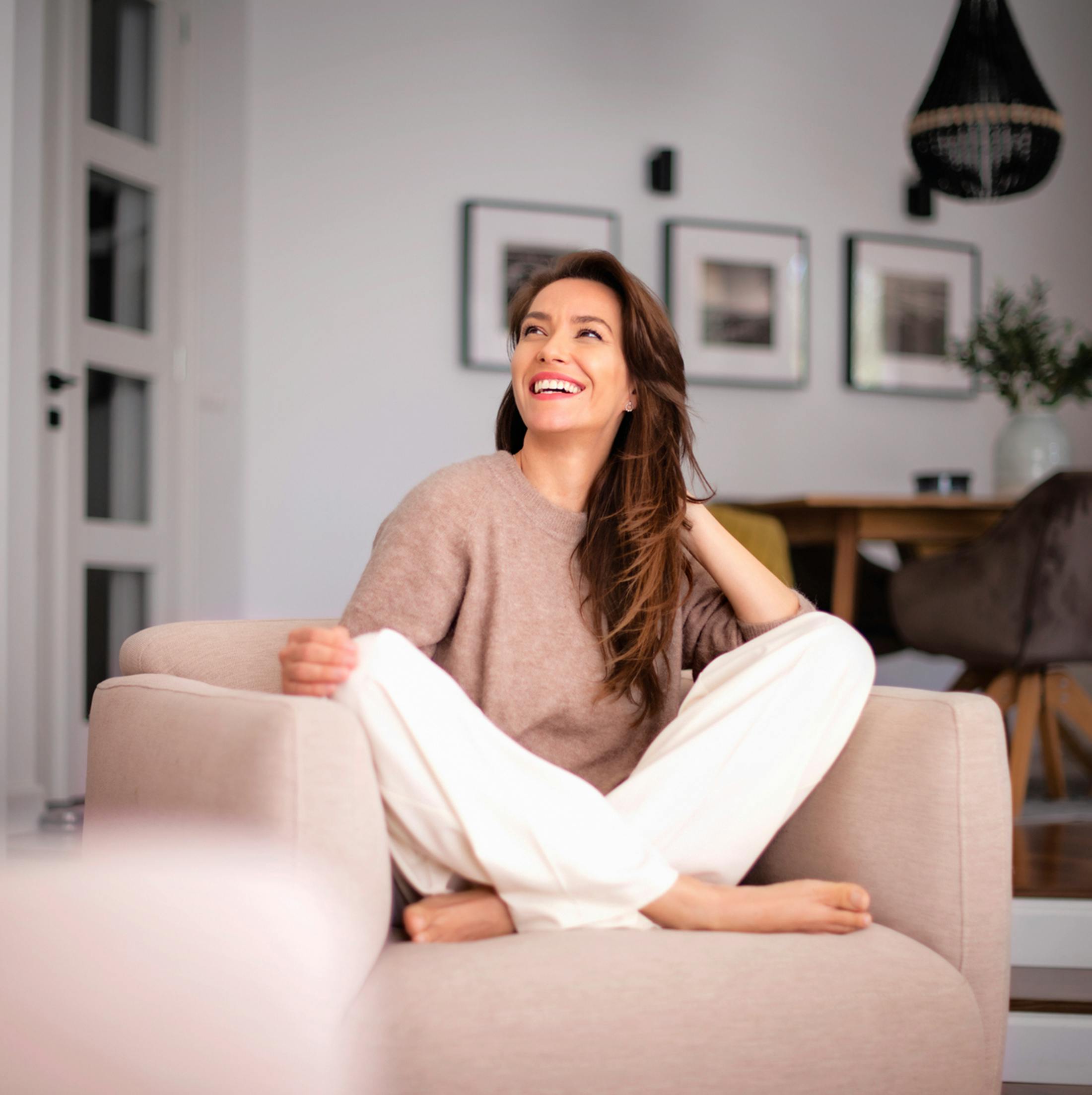 Women laughing in chair