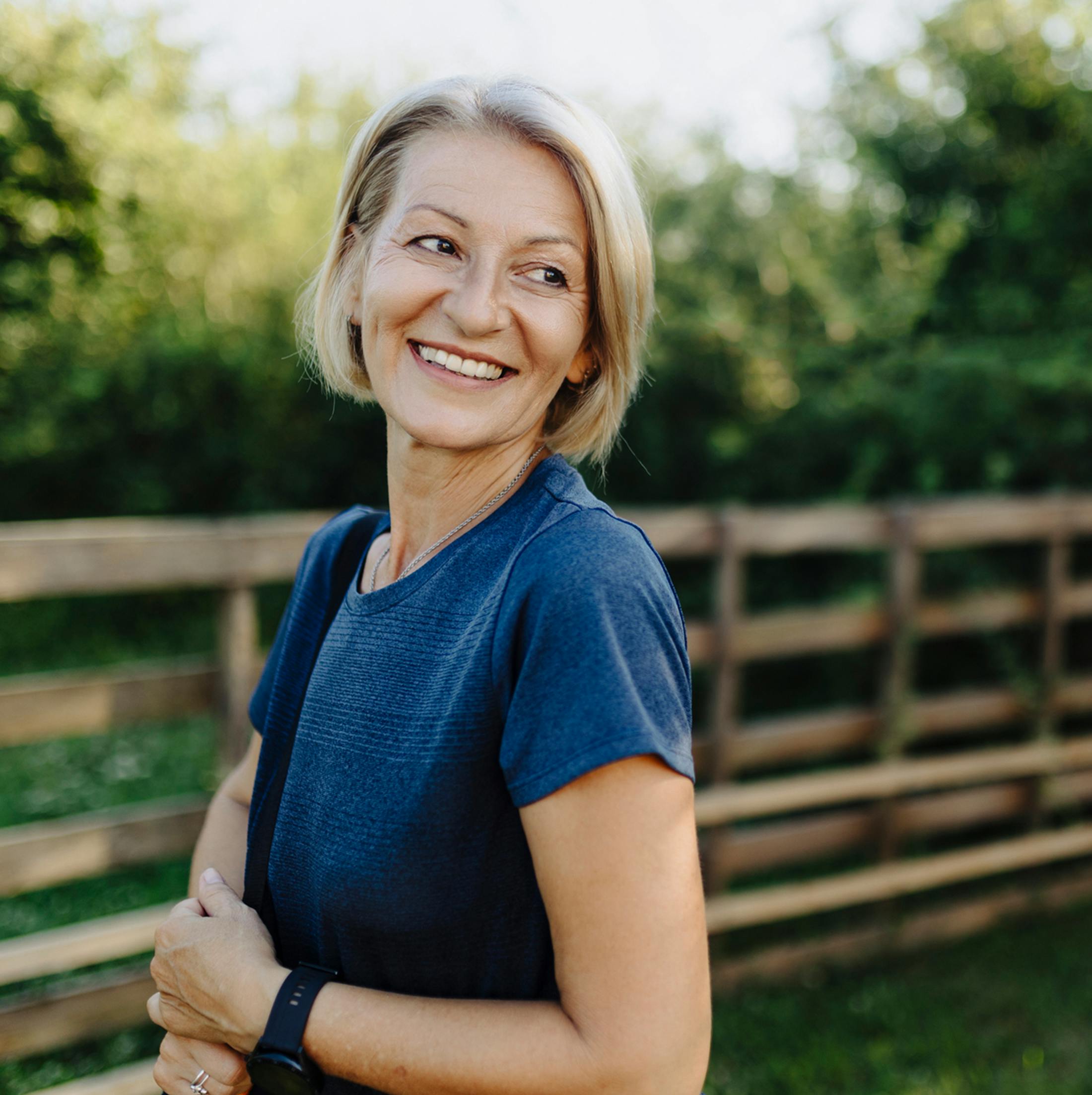 Women smiling over shoulder