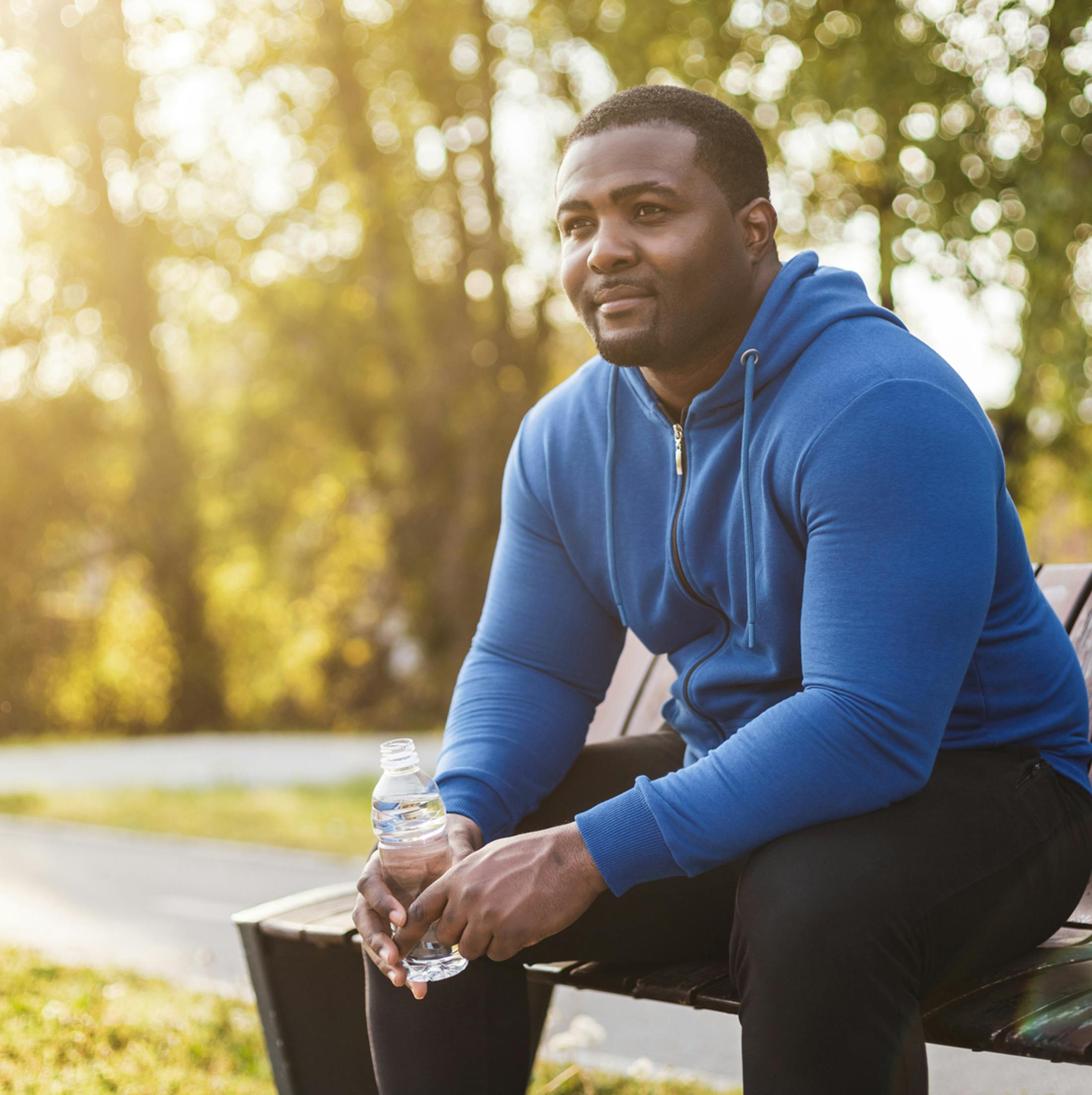 man sitting on a park bench