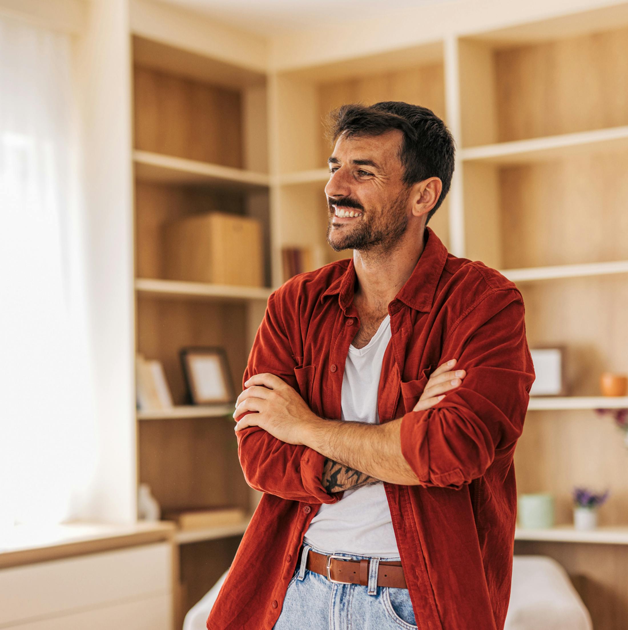 Man standing and smiling