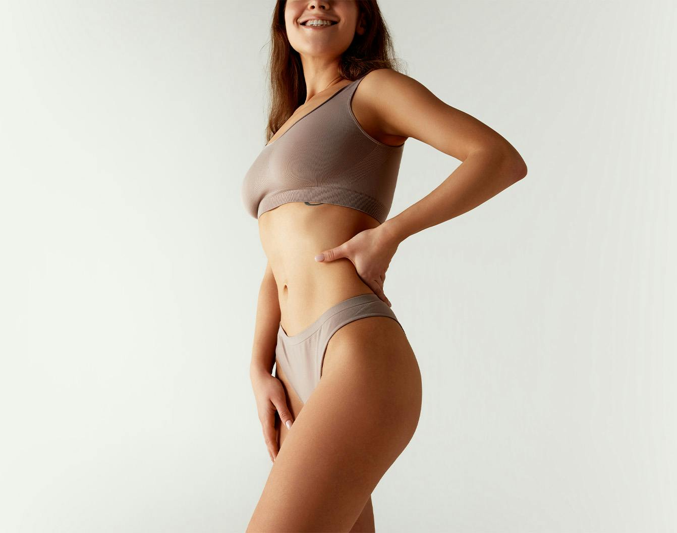 A woman posing with her hand on her hip