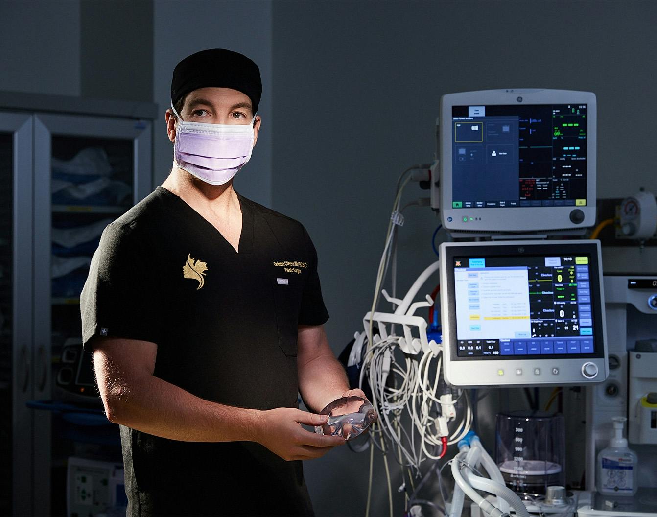 doctor standing by a monitor