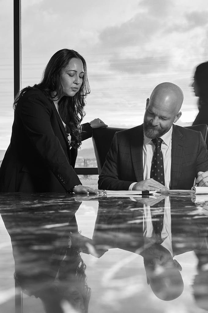 attorneys looking at paperwork