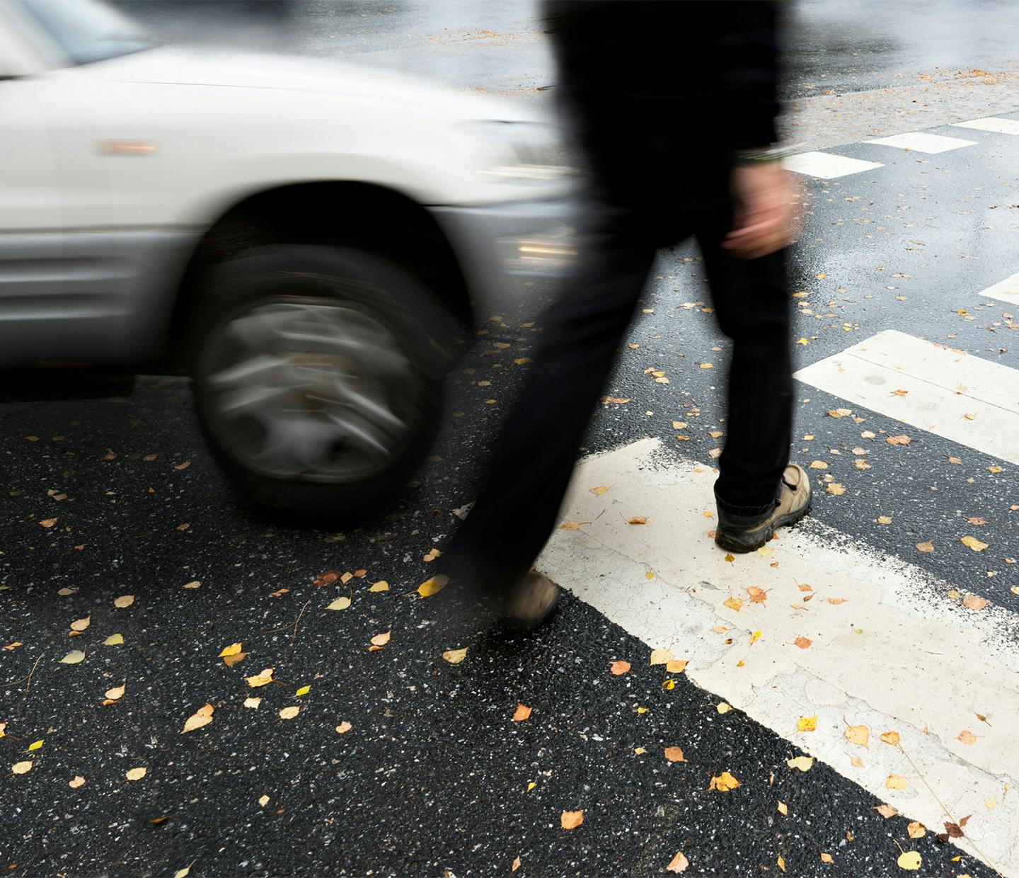 car about to hit pedestrian