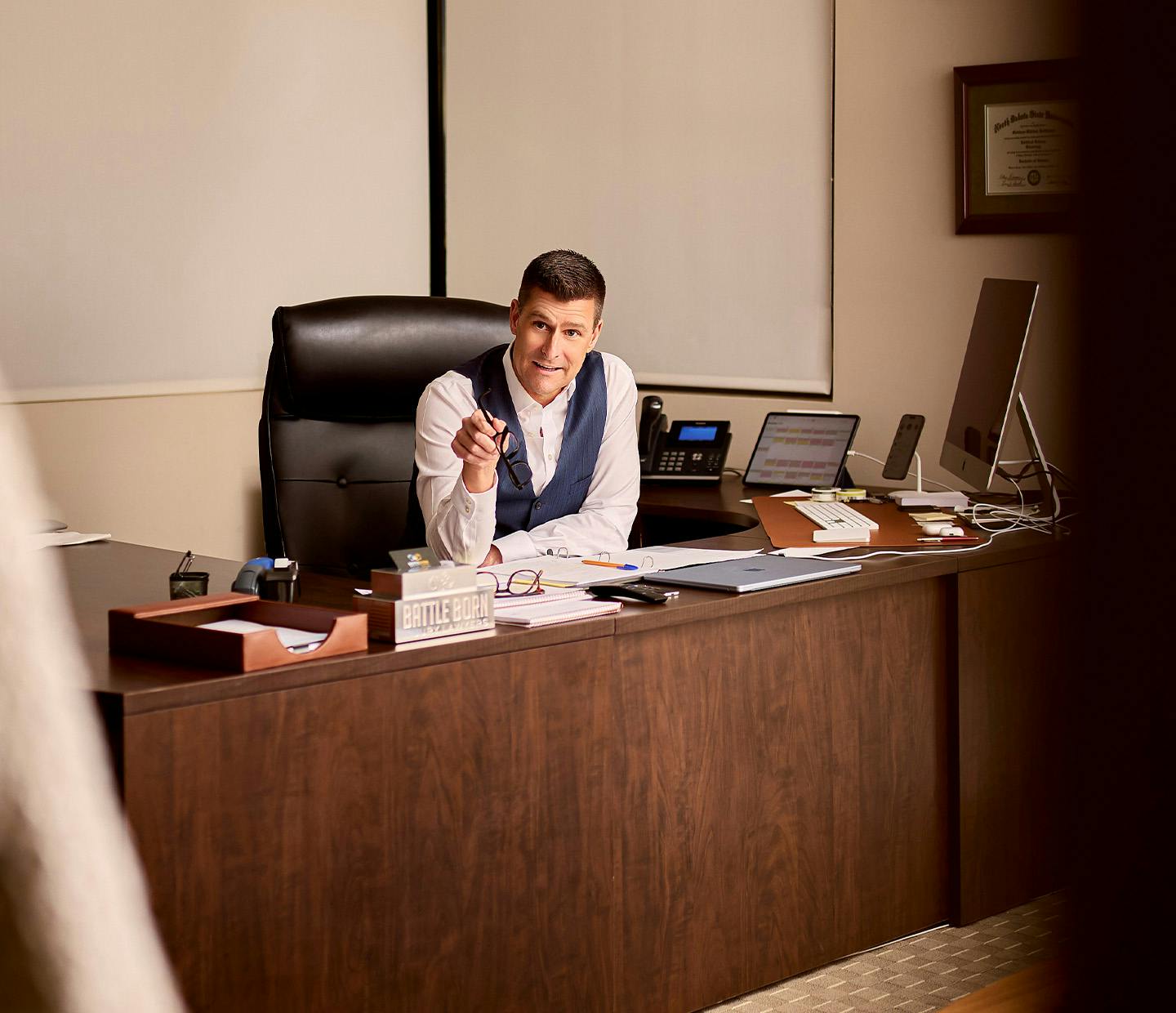 An attorney sitting at a desk