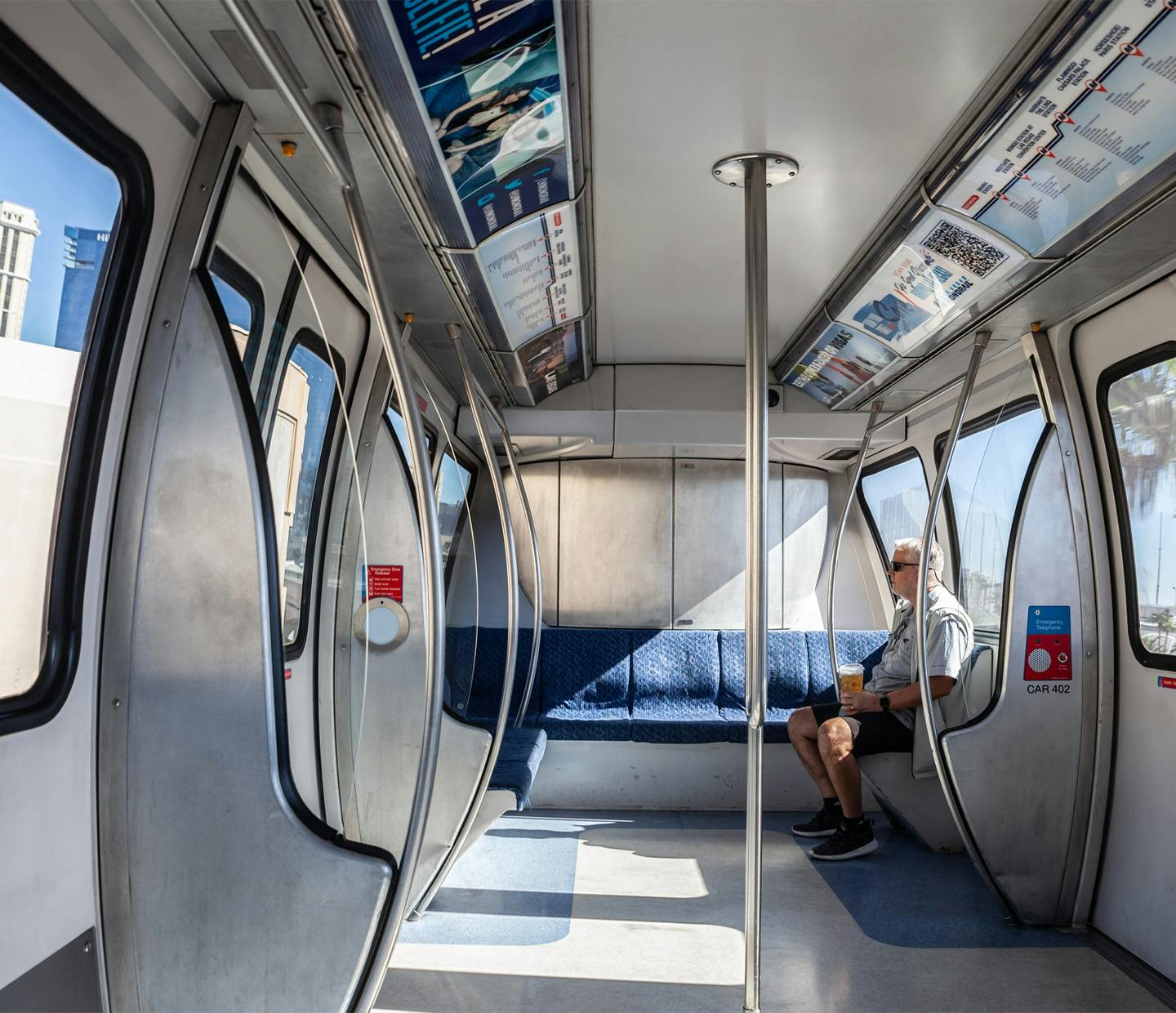 man sitting alone in a train car