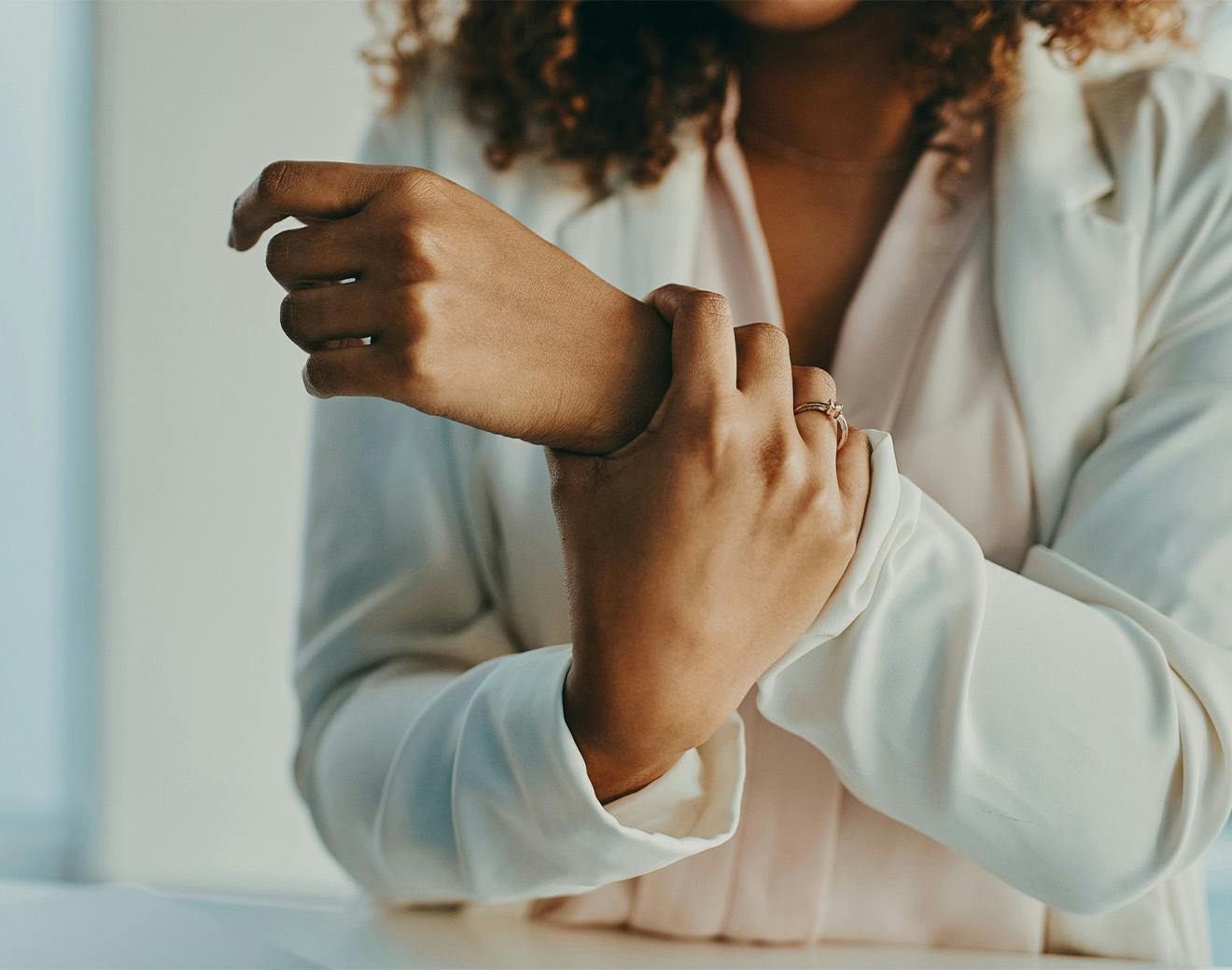 women grabbing her wrist