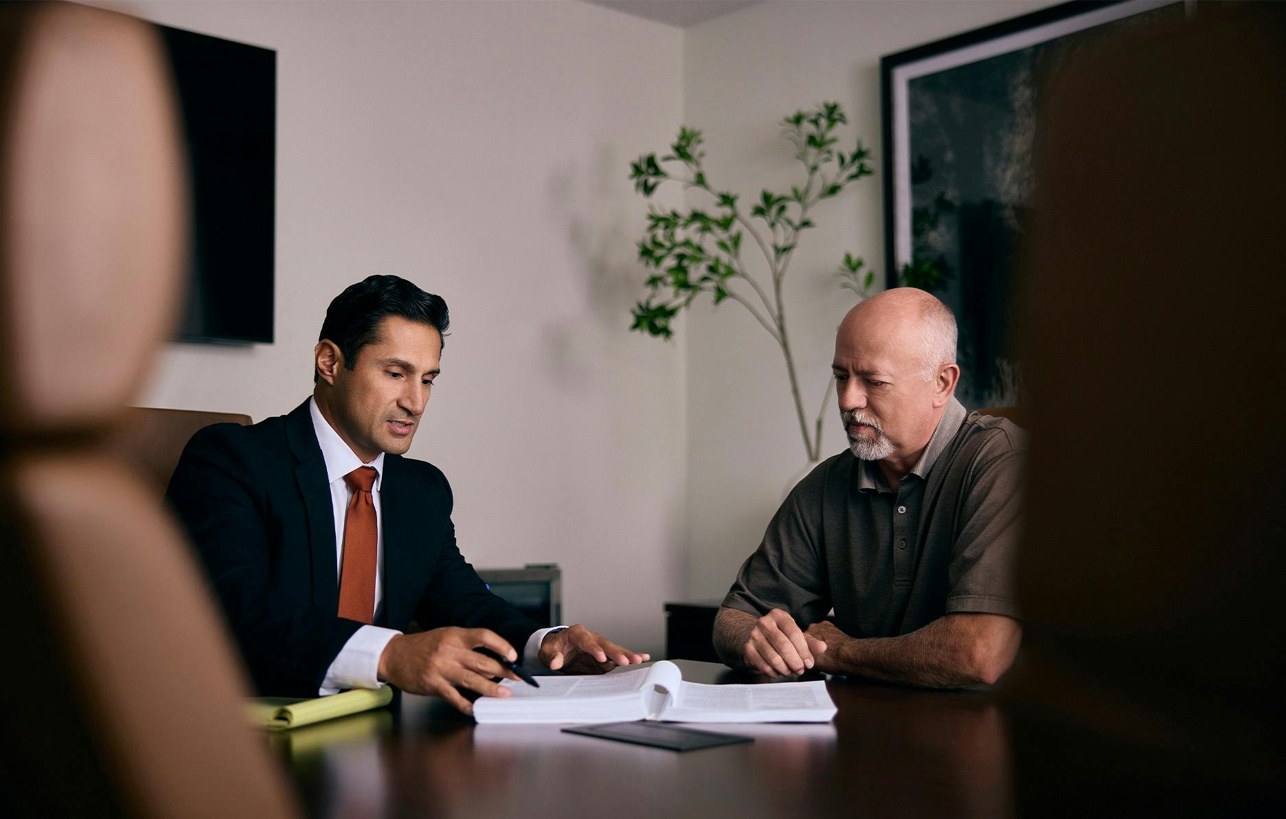 A attorney talking to a client
