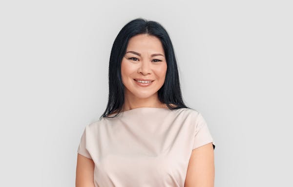 woman smiling looking at camera