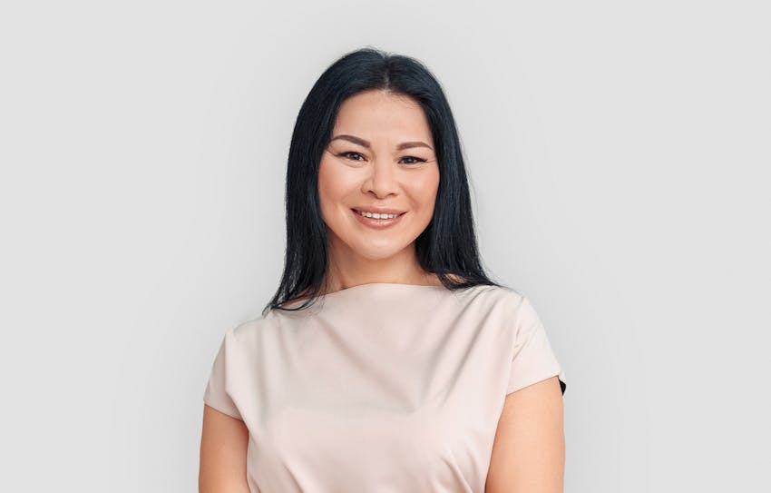 woman smiling looking at camera