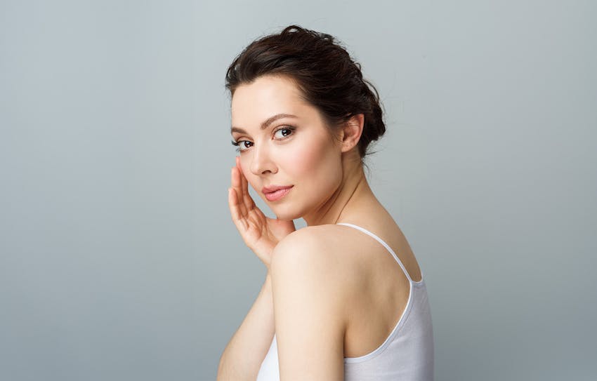 woman looking over shoulder