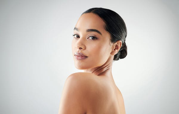 woman looking over shoulder