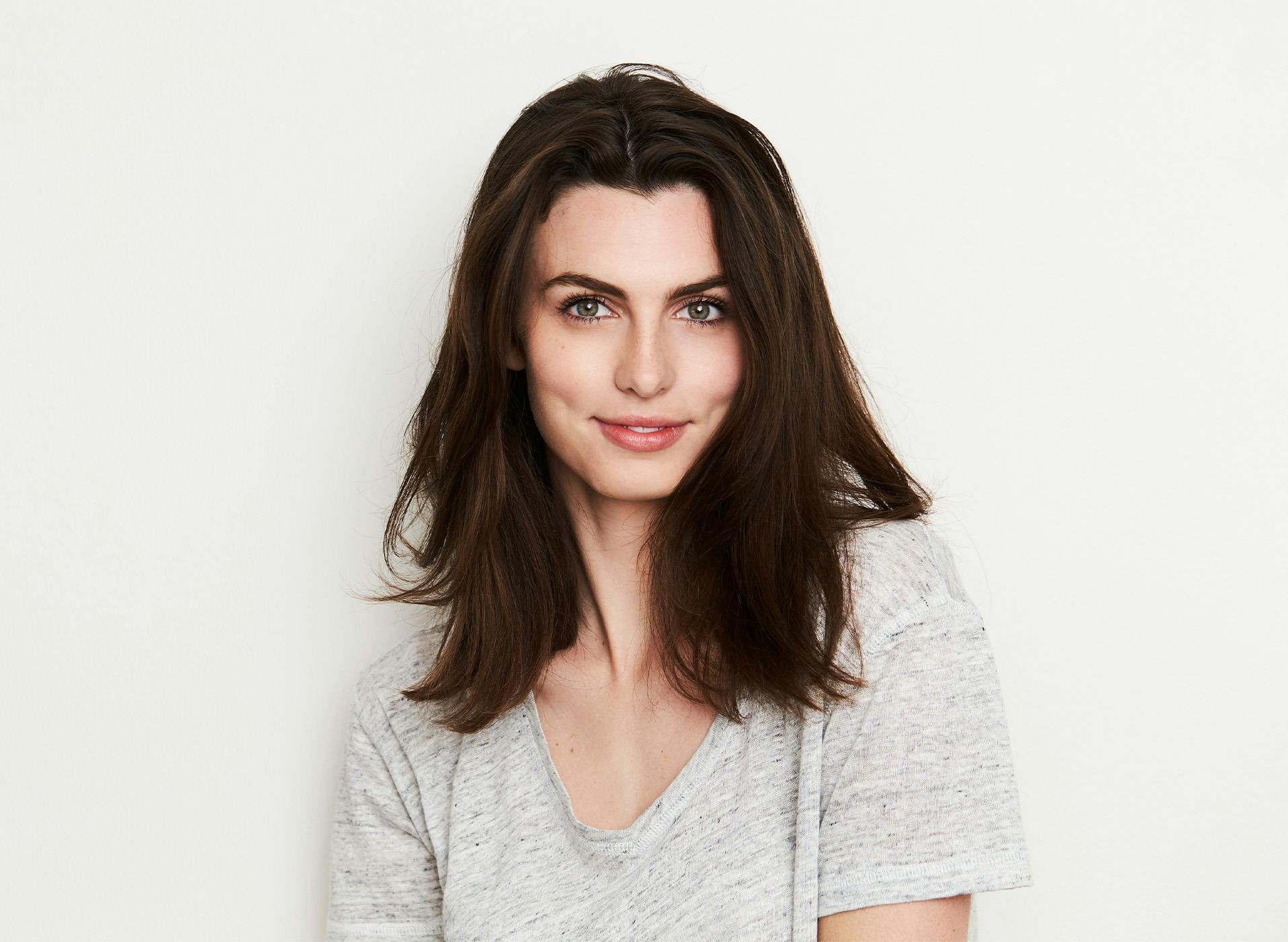 woman looking at camera with a soft smile