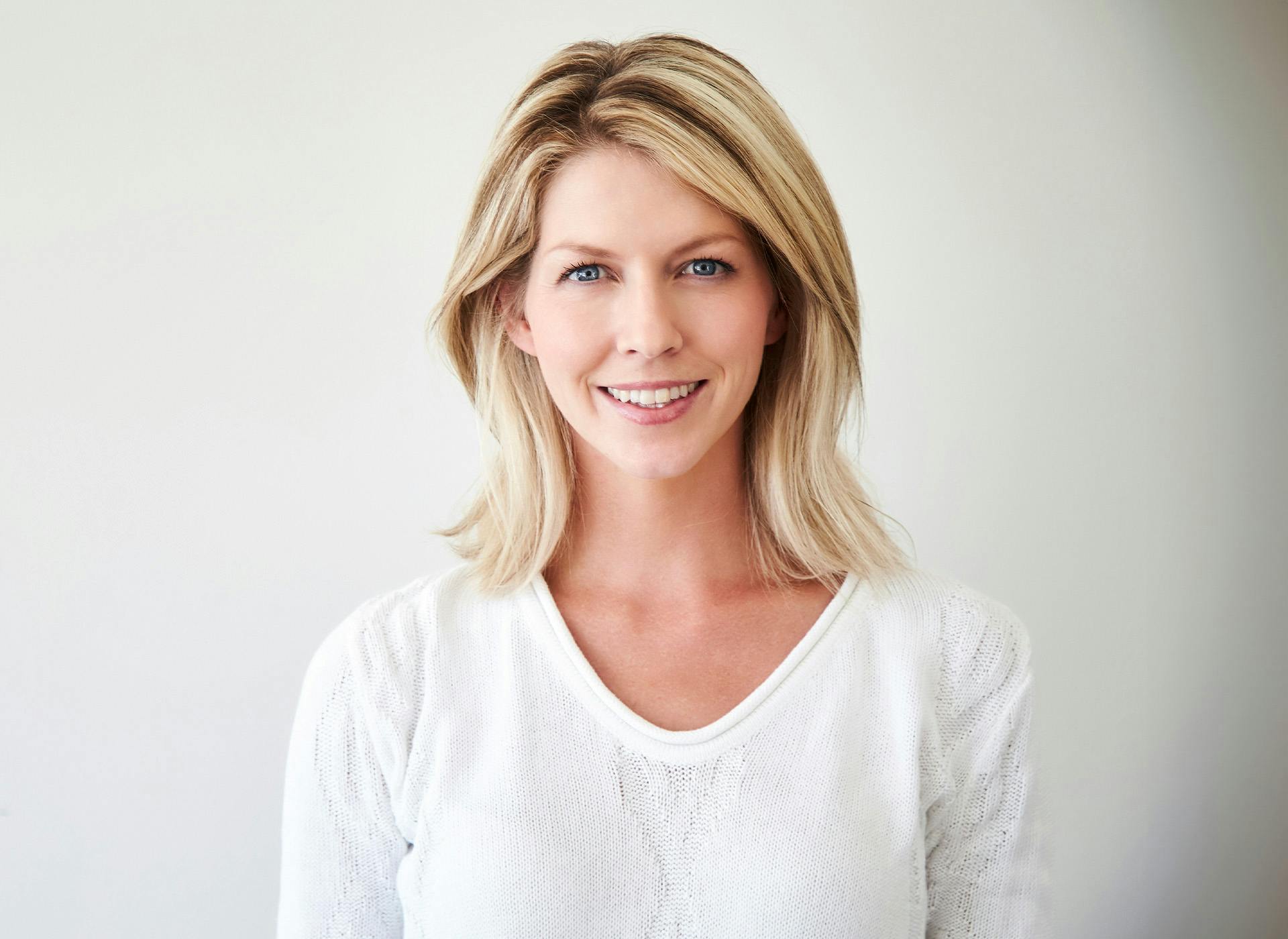 woman smiling looking at camera