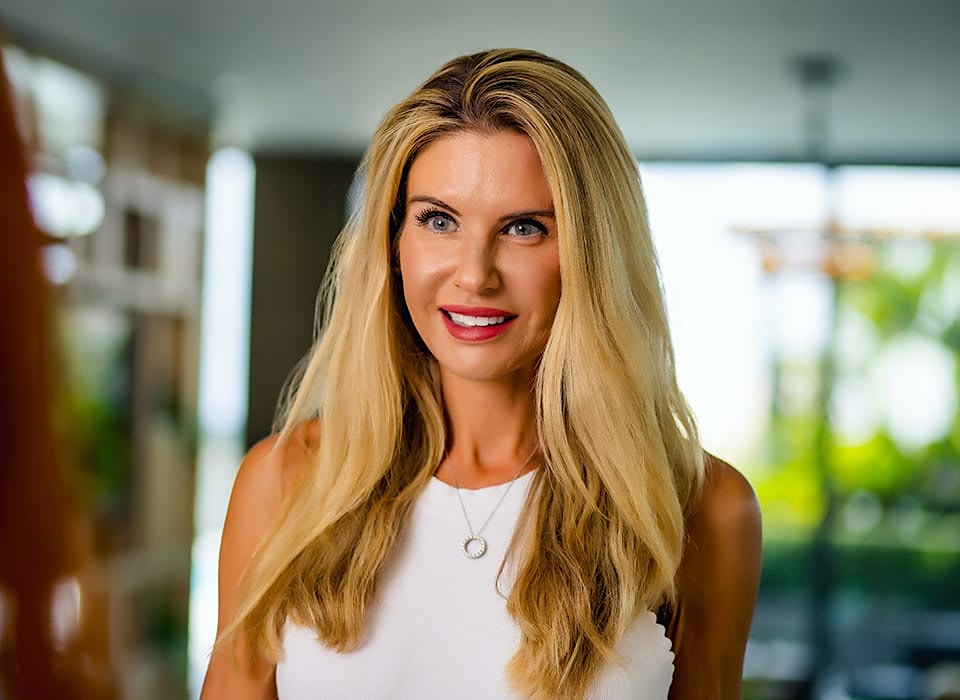 woman with blonde hair smiling