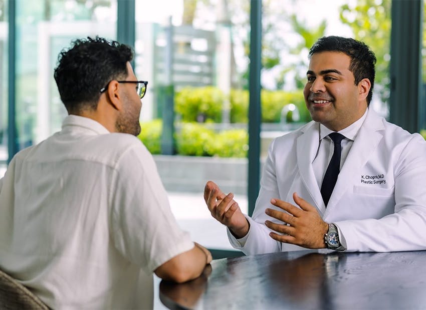 Dr. Chopra speaking to patient