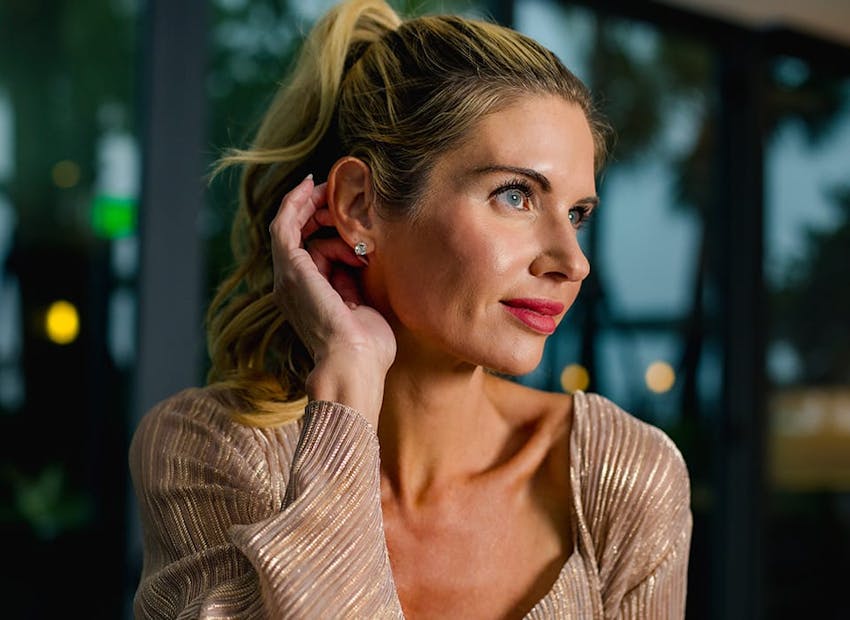 woman with high ponytail getting hit by the sun