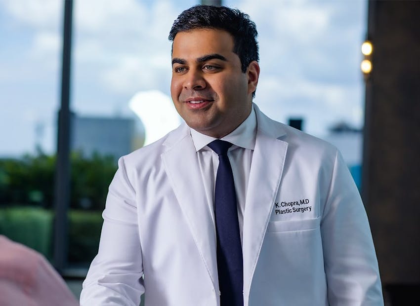 Dr. Chopra in white suit