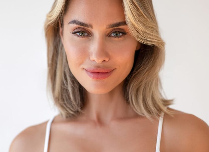 woman smiling forward