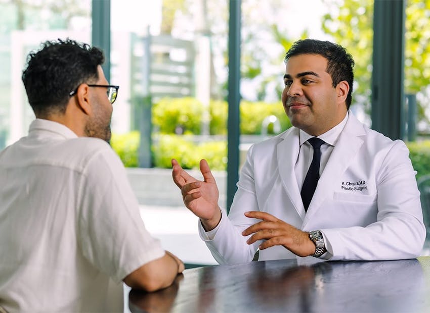 Dr. Chopra speaking to patient