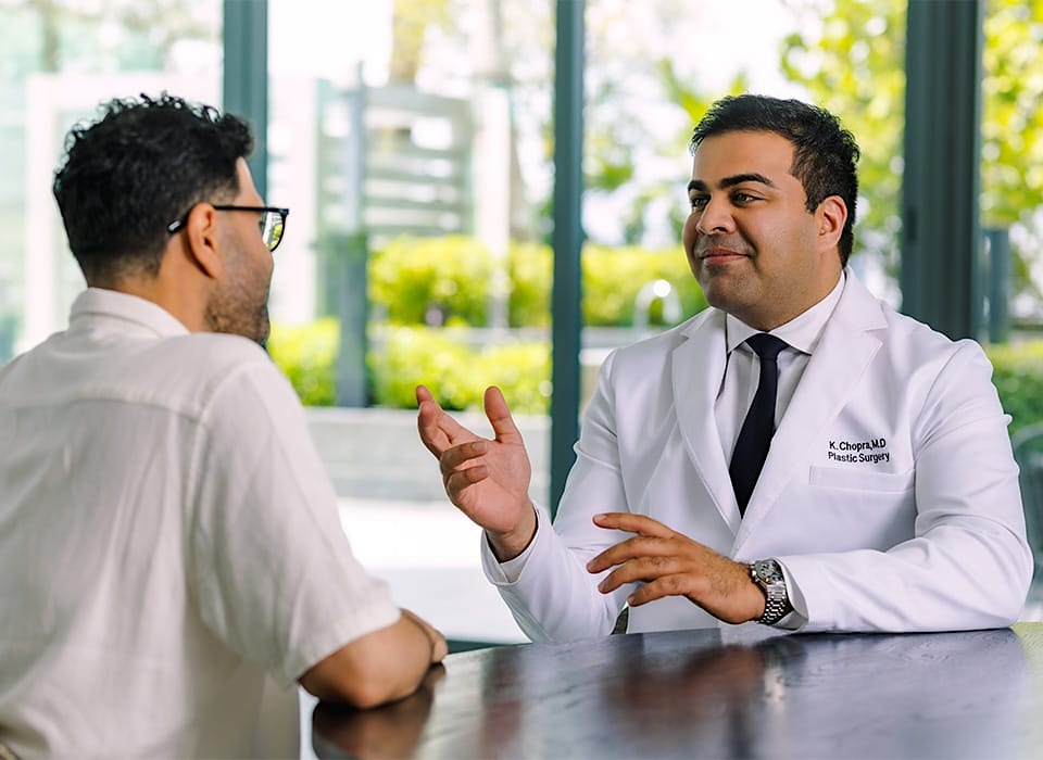 Dr. Chopra speaking to patient