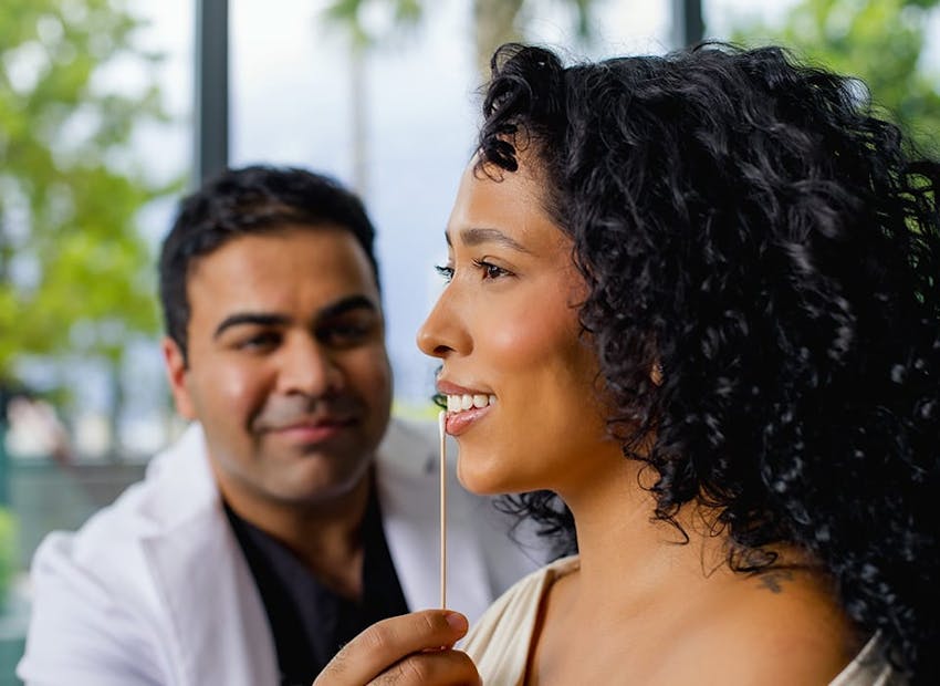 Dr. Chopra looking at patient's lips