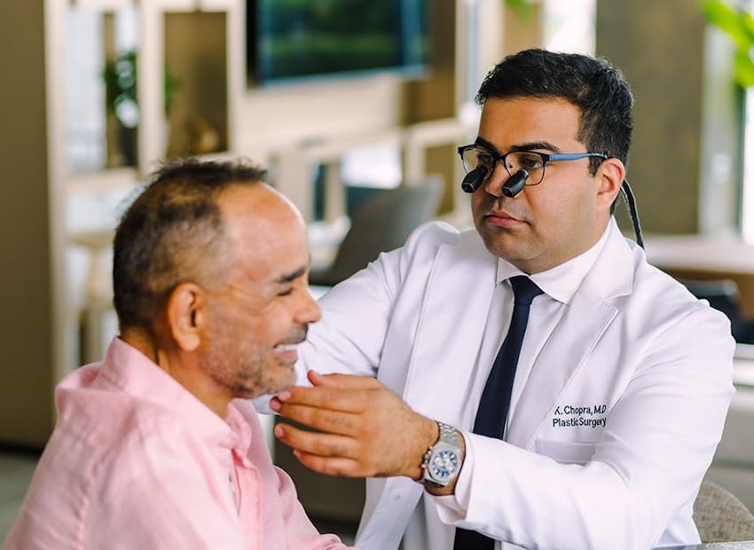 Dr. Chopra with patient smiling