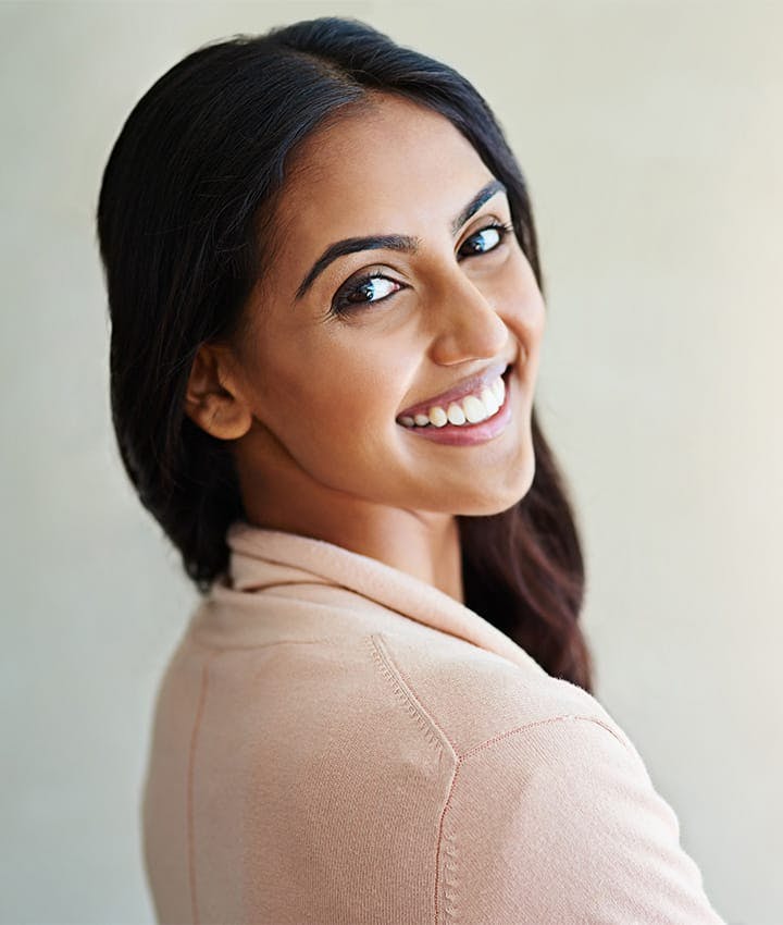 woman looking over her shoulder