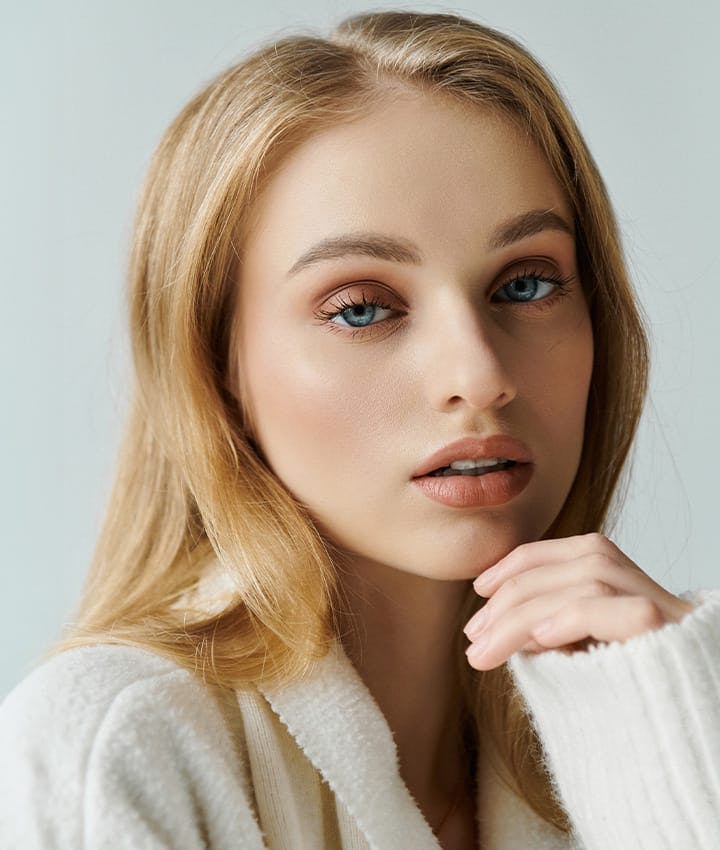 woman in white cardigan