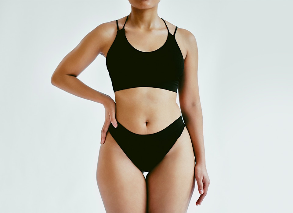 woman in black undergarments