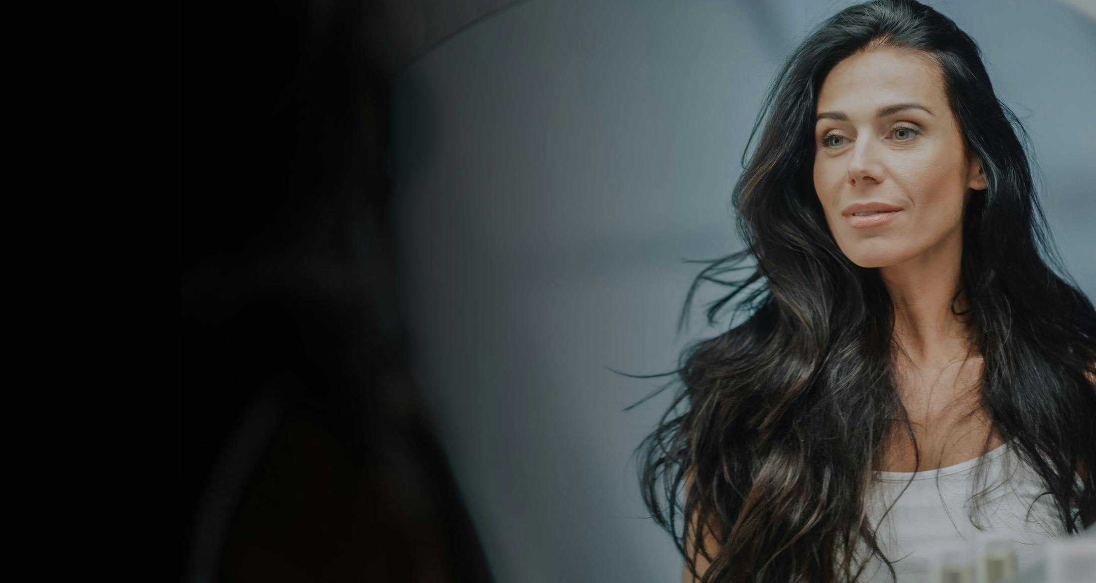 woman with long wavy dark hair