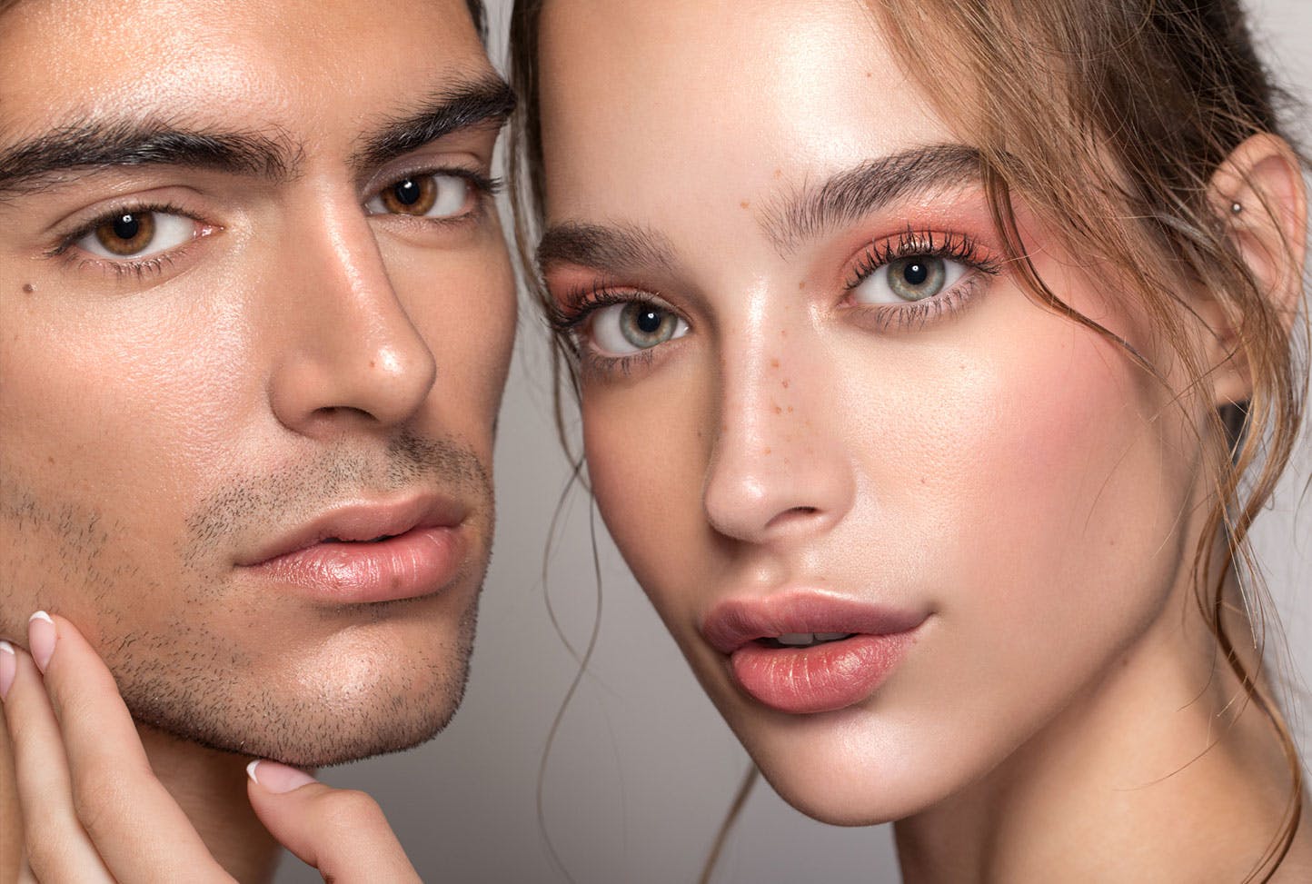 close up of man and womans face