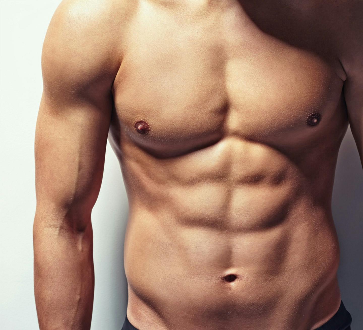 man shirtless with abs
